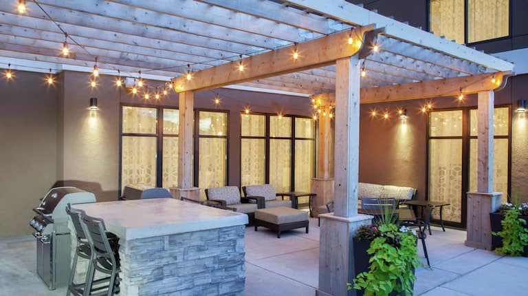 Outdoor Patio Area with Lounge Seating and Barbecue Grills 
