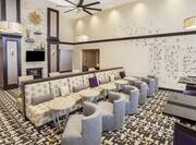 Lodge Lounge area with Elegant Lighting Fixtures and Modern Furnishings 