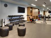 Fitness Center with HDTVs Treadmills and Weights