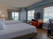 Double Queen Guestroom with Two Beds, Outside View, Lounge Area, Room Technology, and Chair