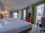 Double Queen Guestroom with Two Beds, Room Technology, Lounge Area, Outside View, and Work Desk