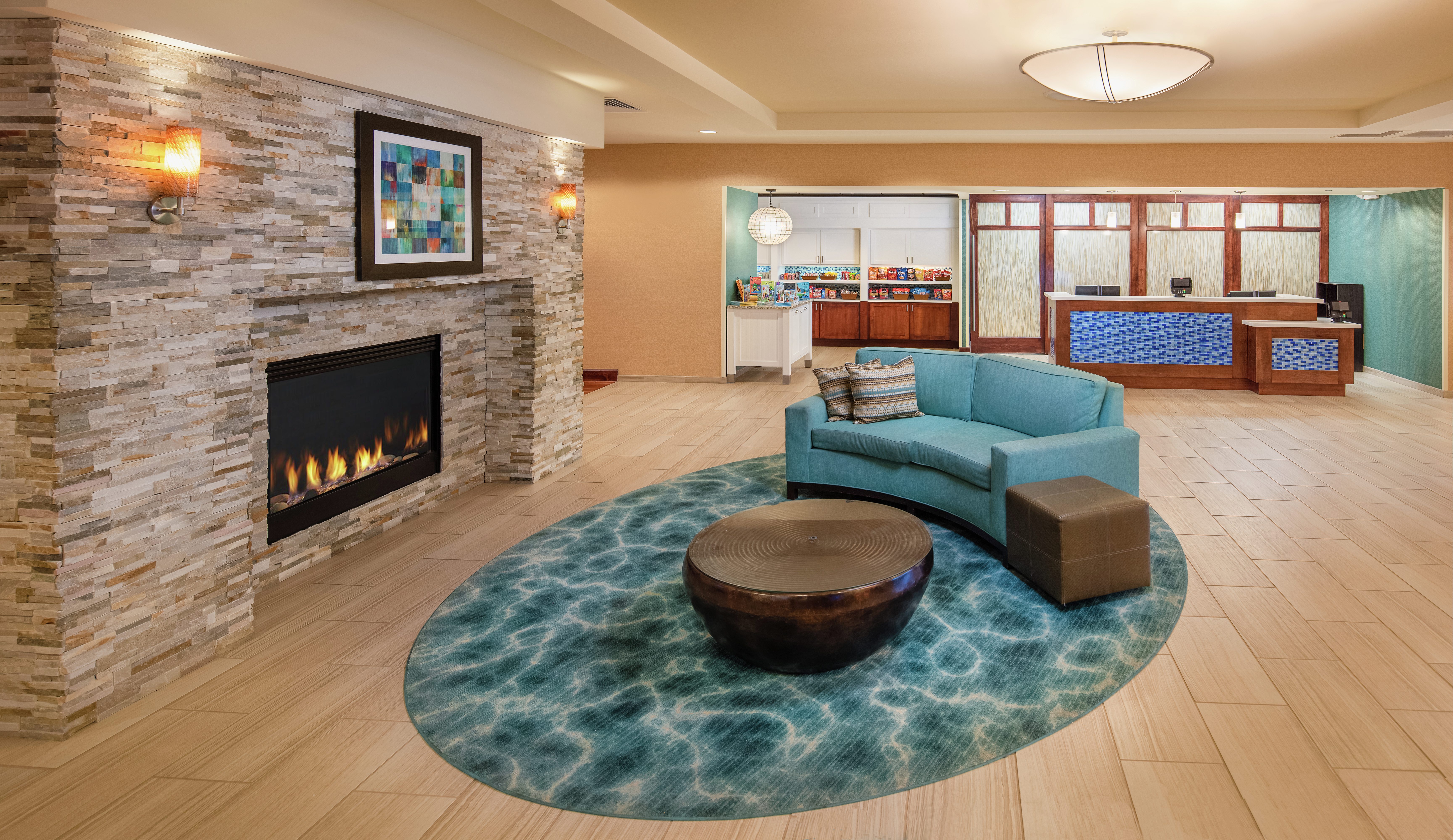 Lobby Seating with Fireplace and Front Desk