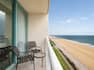 Expansive ocean view from convenient guest room patio 