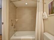 Bathroom with tub and shower