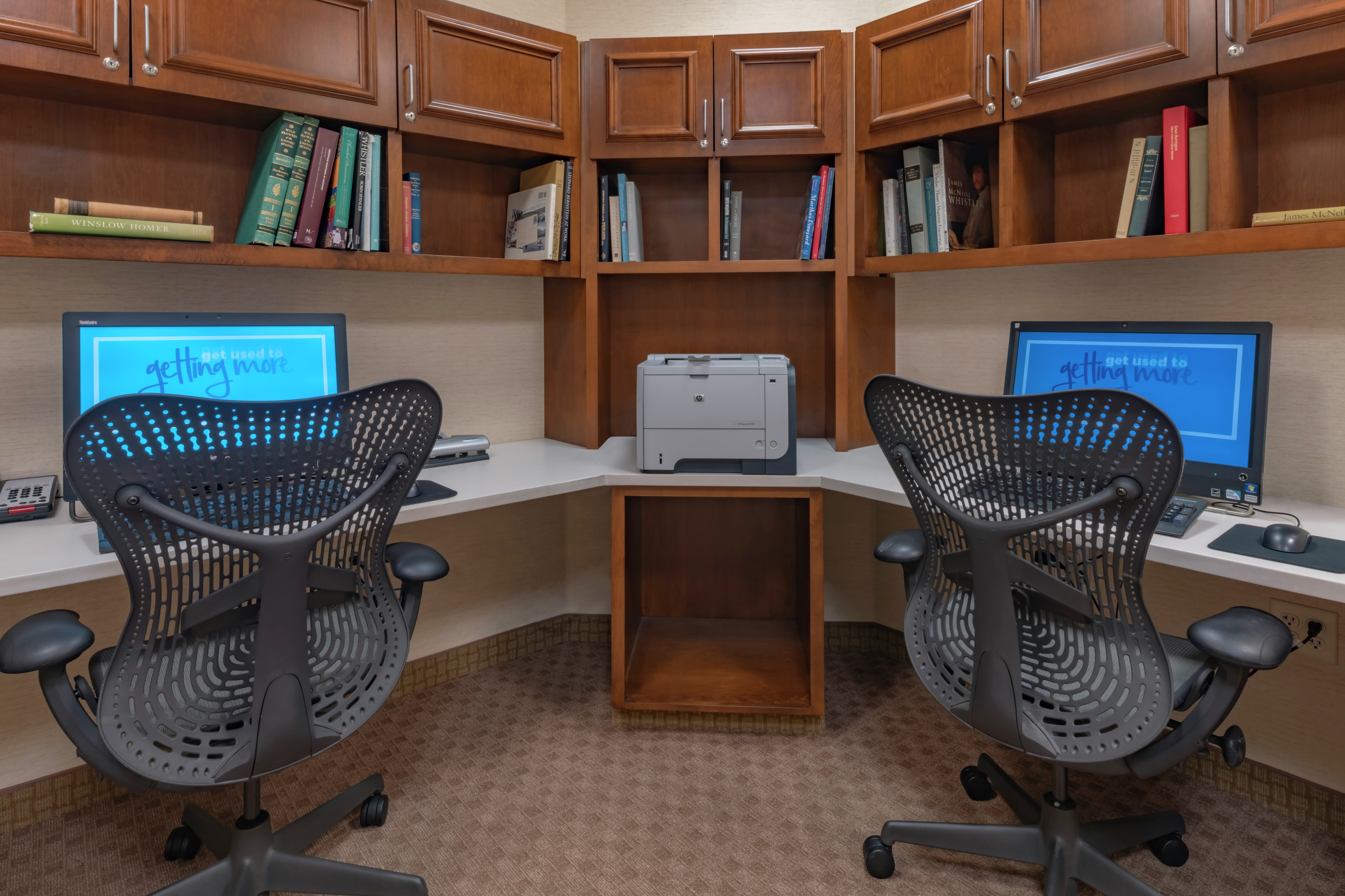 Business Center with Two Office Chairs, Two Computers and Printer