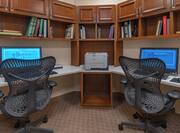 Business Center with Two Office Chairs, Two Computers and Printer