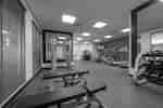 Fitness Center with Weight Benches, Weight Machine, Treadmills and Cross-Trainer