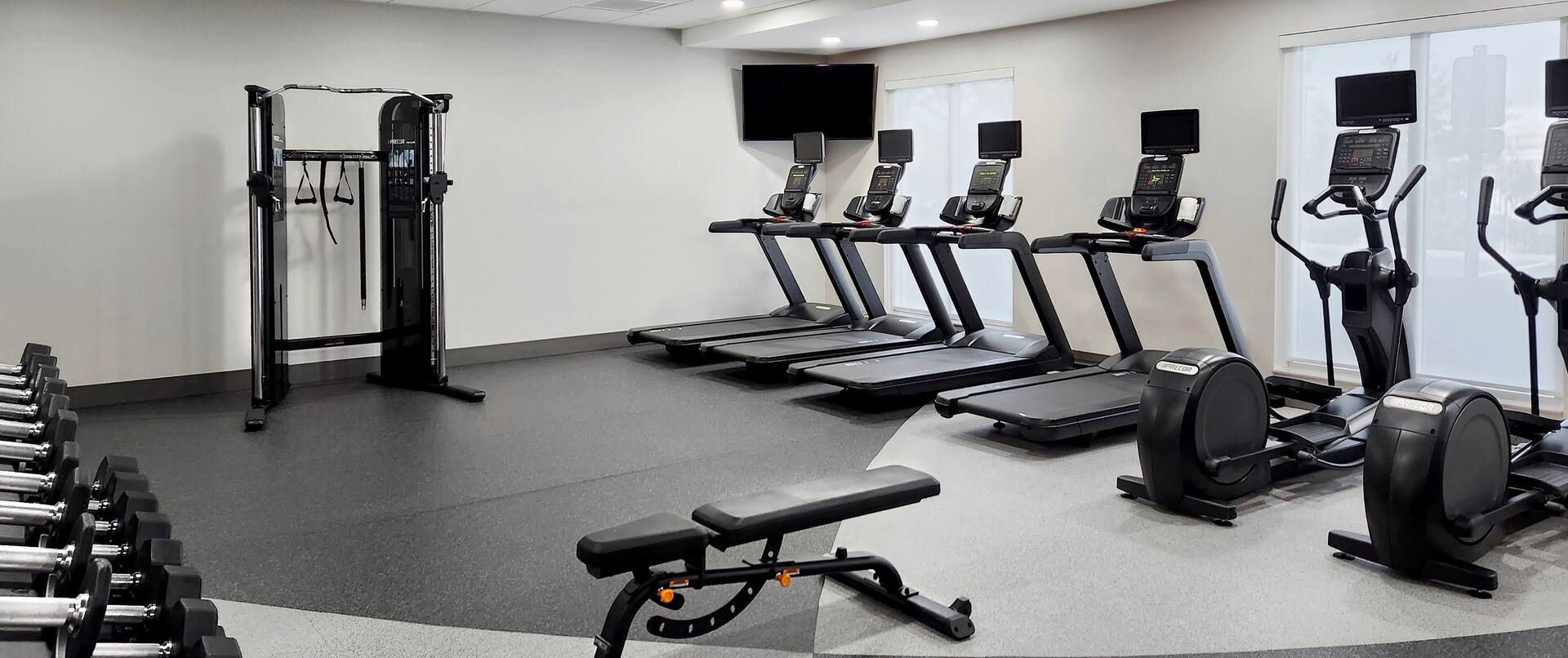 Treadmills and Weights in Fitness Center