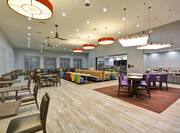 Homewood Suites by Hilton Orlando Theme Parks - Breakfast Dining Area Tables