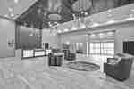 Homewood Suites by Hilton Orlando Theme Parks - Front Desk with Seating Area