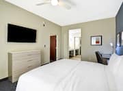 Homewood Suites by Hilton Orlando Theme Parks - King Suite with Sofa Bed, Dresser and TV