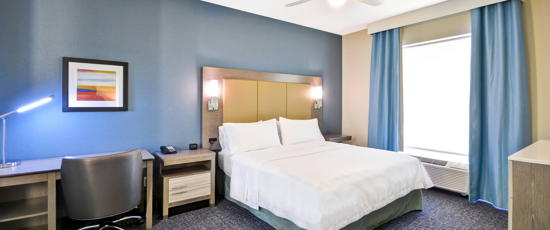 Homewood Suites by Hilton Orlando Theme Parks - King Suite Bed, Chair and Window