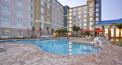 Homewood Suites by Hilton Orlando Theme Parks - Outdoor Pool and Exterior Hotel View