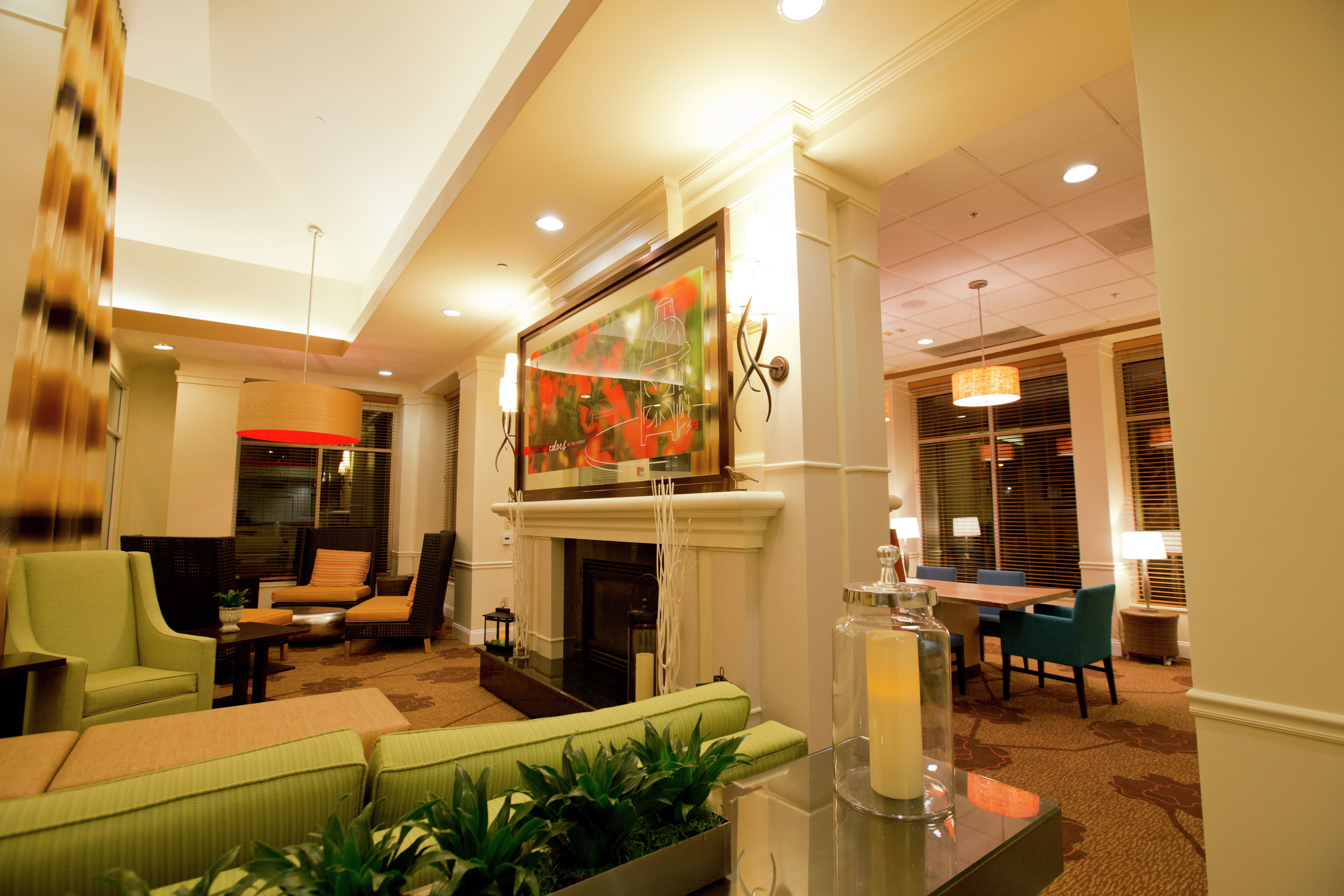 Fireplace With Art Feature, and Mixed Seating in Lobby Lounge Area