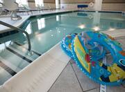 Indoor Pool Area with inflatable tubes in foreground