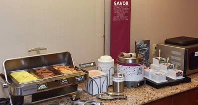 Enjoy free hot breakfast served daily at the Hampton Inn and Suites in Murray.