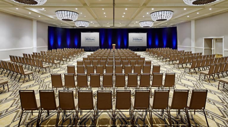 Spacious Ballroom Theater Setup with Two Projector Screens