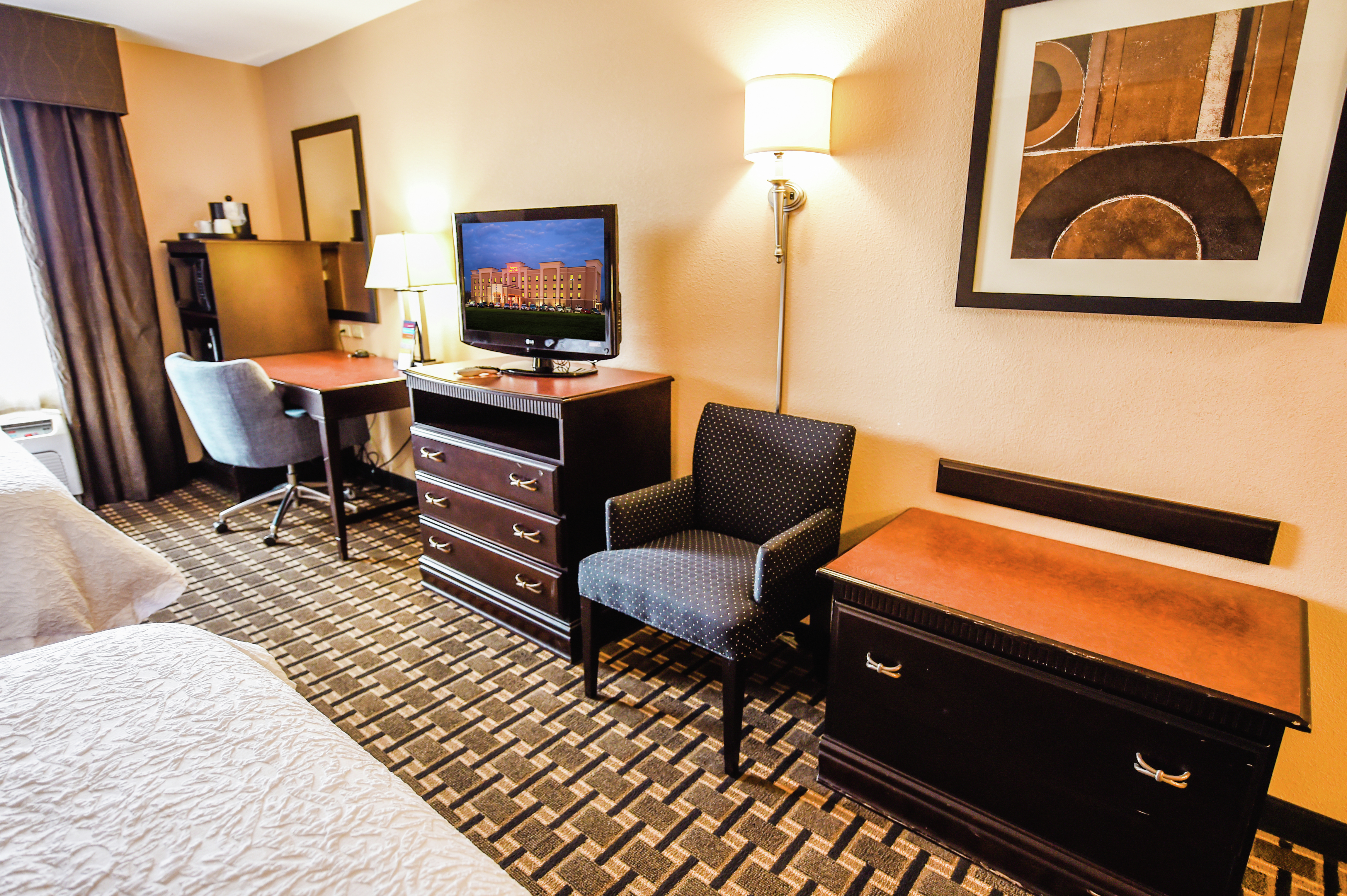 Guest Room Amenities such as TV and Desk Area