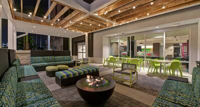 Outdoor Patio Seating with Firepit at Dusk