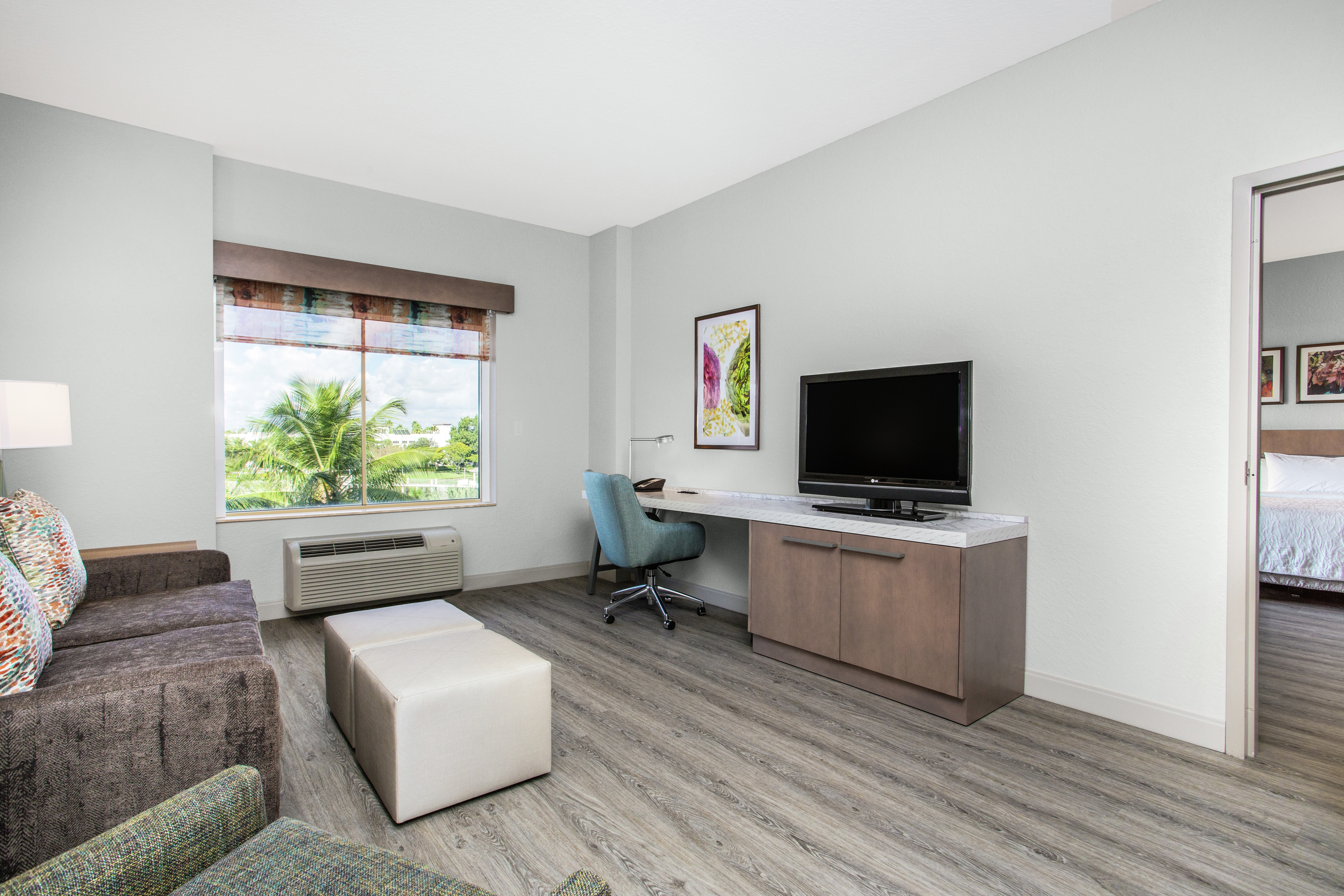 Accessible Guestroom Queen Suite with Lounge Area, Work Desk, and Room Technology