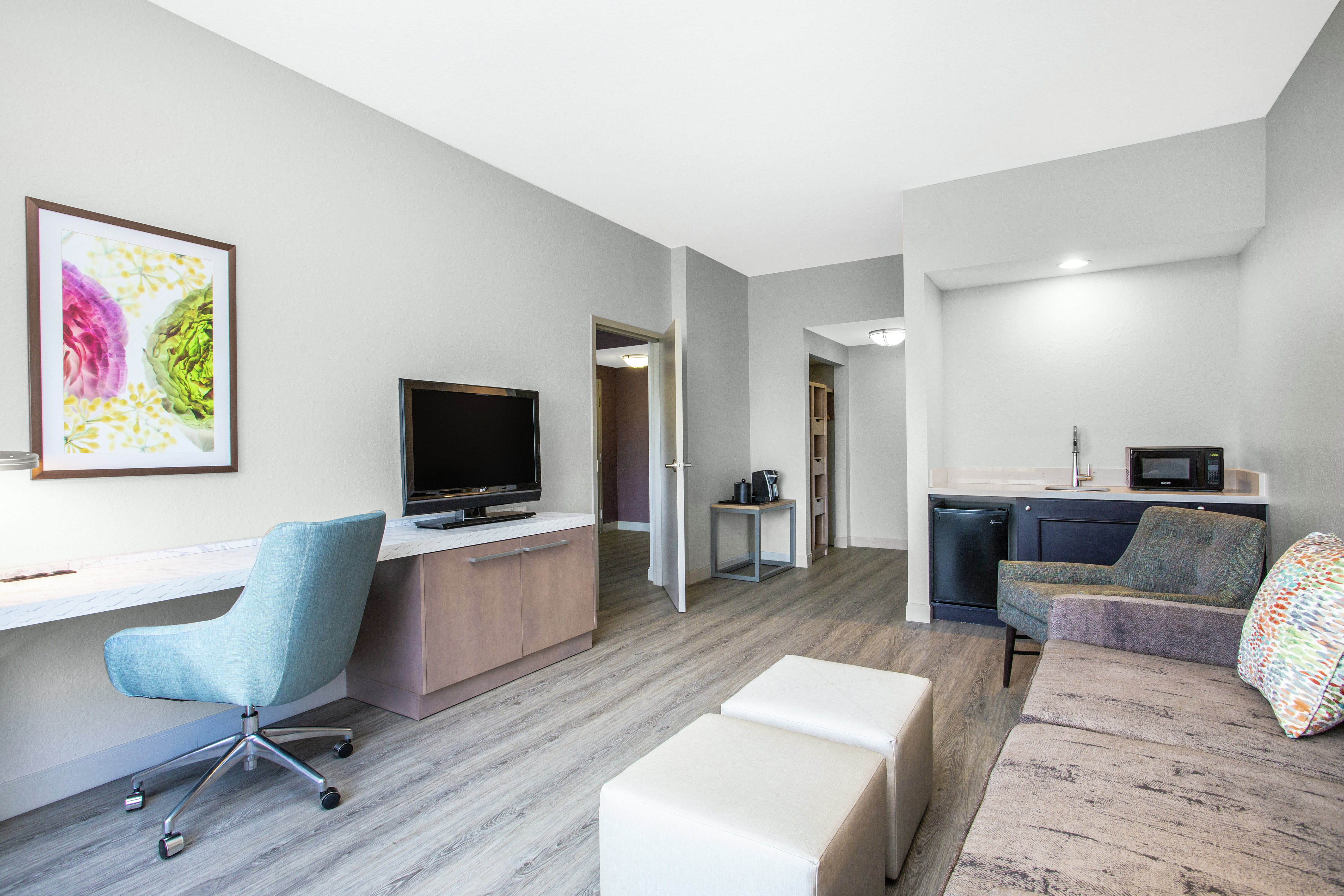 Accessible Guestroom Queen Suite with Kitchenette, Lounge Area, Work Desk, and Room Technology