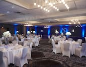 Ballroom Wedding Reception with Round Tables and Chairs