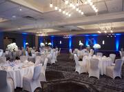 Ballroom Wedding Reception with Round Tables and Chairs