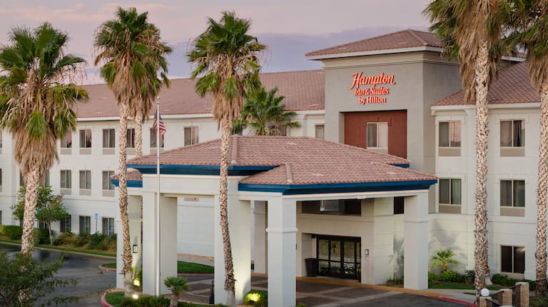 Drone shot capturing the hotel’s entrance and porte-cochère.