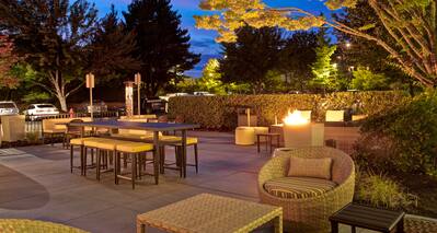 exterior patio at dusk with fire pit