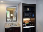 Guestroom Wet Bar Kitchen Area with Microwave, Coffee Maker and Mini Fridge
