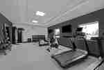 fitness center with weights and exercise machines