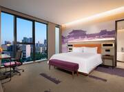 Business Suite Room with King Bed and Outside View