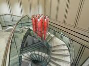 Spiral Staircase with Marble Floors and Dangling Chandelier