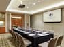 Banksia Boardroom with Table, Chairs, Projector, and Projector Screen
