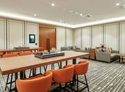 DoubleTree Hotel Breakout Room with Tables, Chairs, and Booths