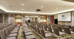 Wattle and Jarrah Meeting Rooms with Chairs and Projector Screen