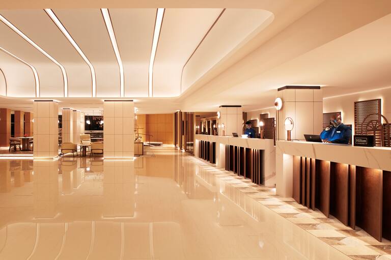 lobby, front desk with hotel staff