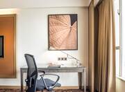 Workdesk with Chair and Art on Wall