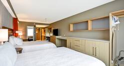 Double Queen Bedroom Suite with HDTV and Desk Area