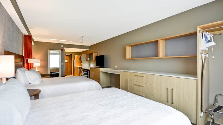 Double Queen Bedroom Suite with HDTV and Desk Area