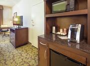 Guest Bedroom Beverage Station, Work Desk and Television with Amenities