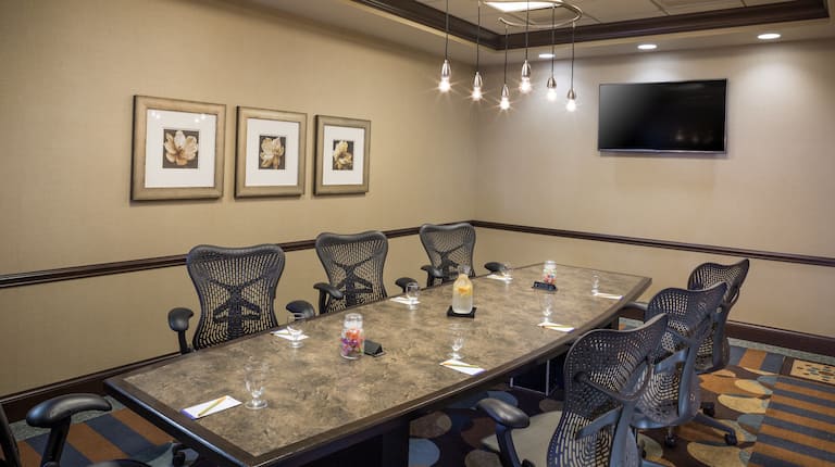 Seating for 7 at Table and TV in Langley Boardroom