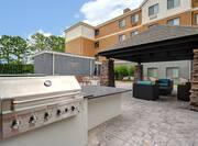 exterior patio with barbeque
