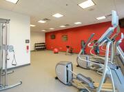 Fitness Center With TV, Cardio Equipment, Weight Machine, Free Weights, Weight Balls, Red Stability and Water Cooler