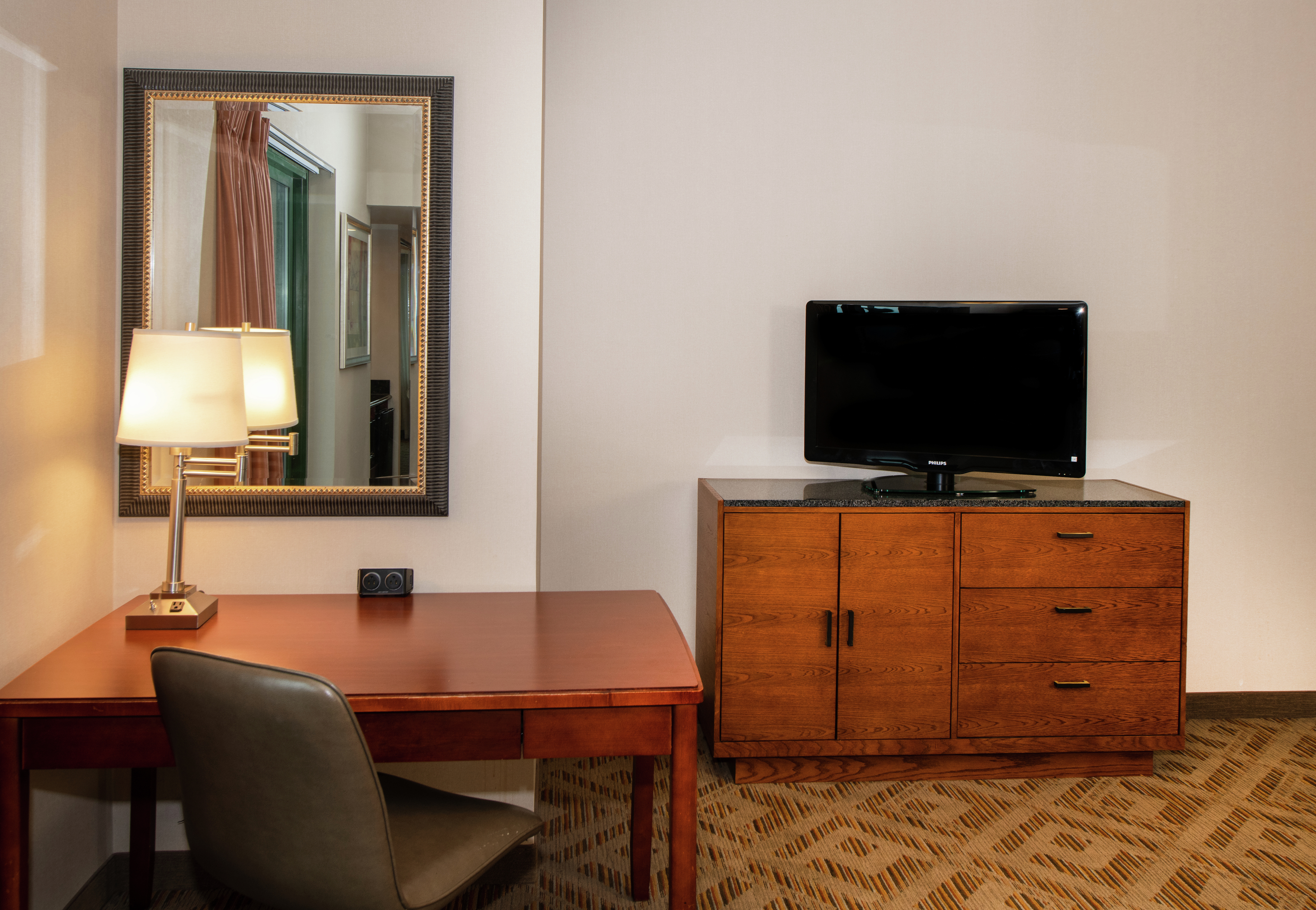 Executive suite features a separate living room and work area.
