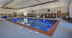indoor pool with seating
