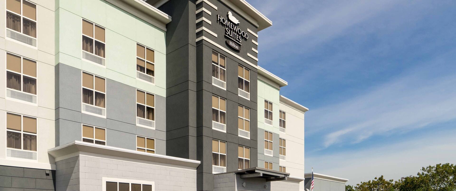 Front Hotel Exterior with signage and circular drive