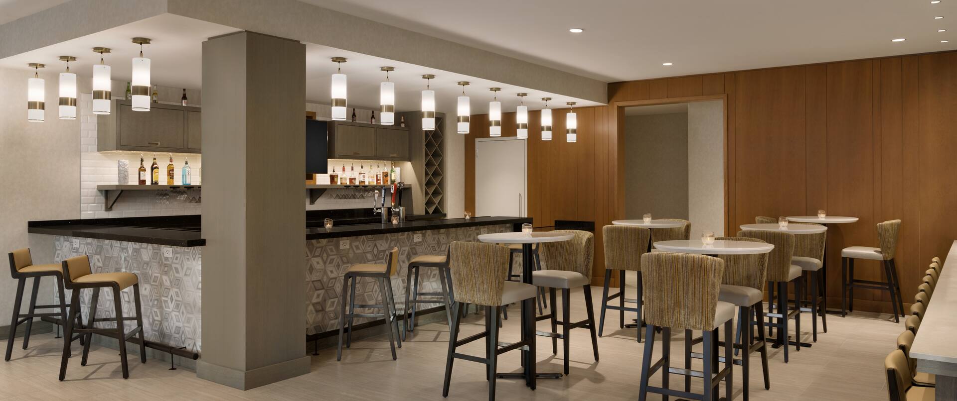 Bar Lounge Area with Bar Counter and Bar Stools