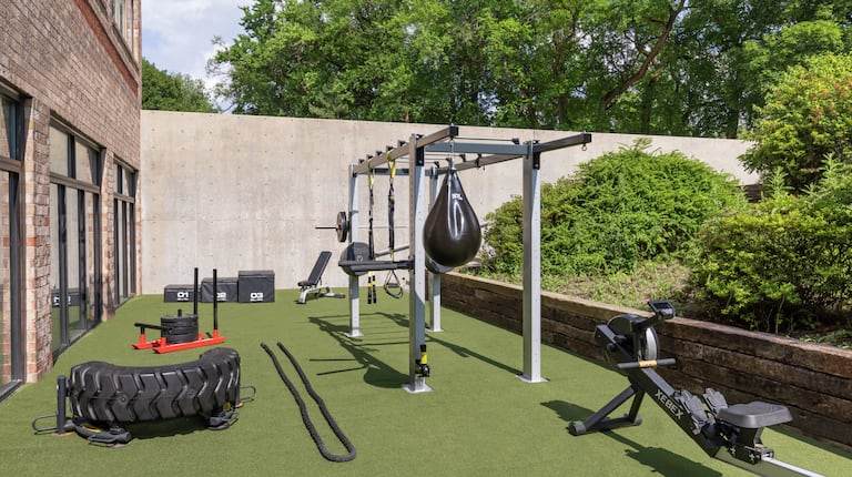 Beautiful outdoor fitness space featuring cross-fit obstacle course.
