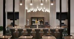 On-site bar featuring ample seating, stunning design, and delicious beverages.